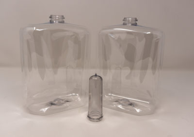 Clear stretch blow molded bottles with preform