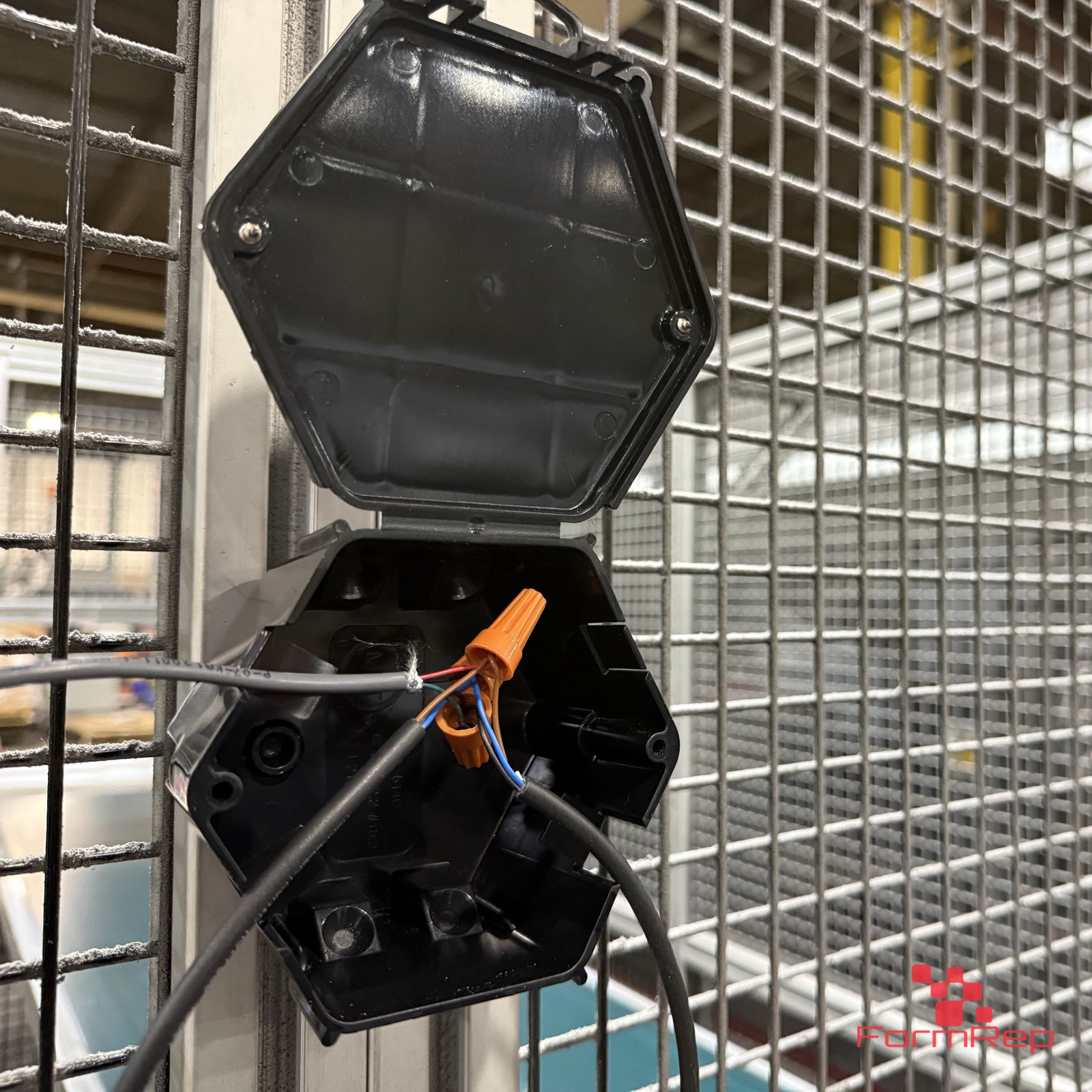 Open Splice Junction Box open on a guard fence Open Splice Junction Box open on a guard fence, showing the splice inside