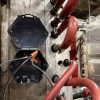 Open Splice Junction Box open on an injection mold Open Splice Junction Box open on an injection mold, showing a wire splice inside