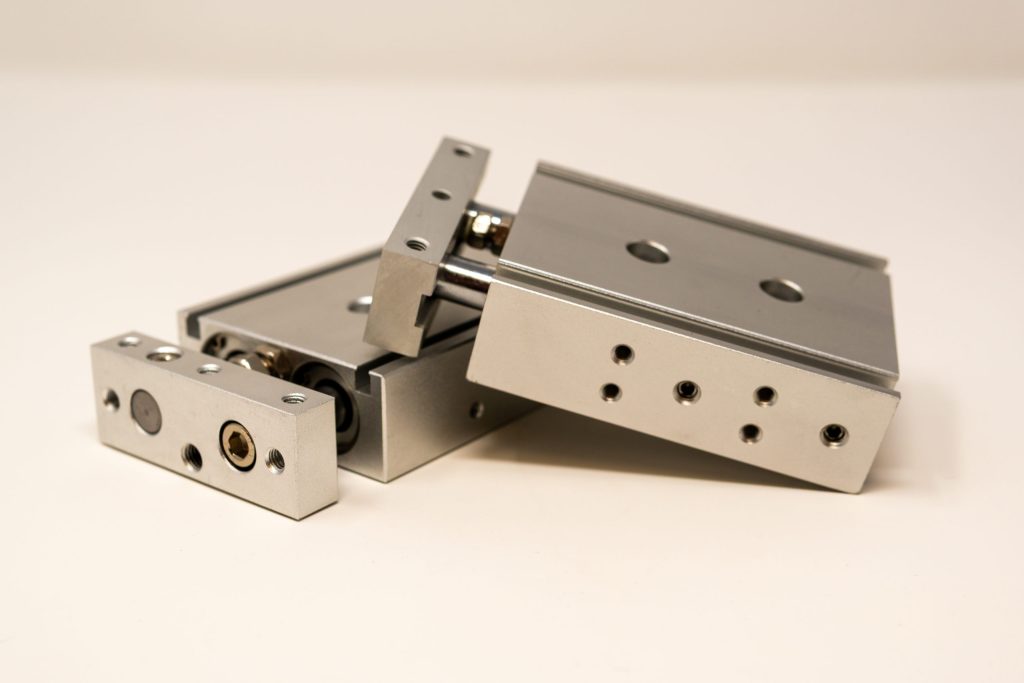 CNC machined aluminum slide assembly