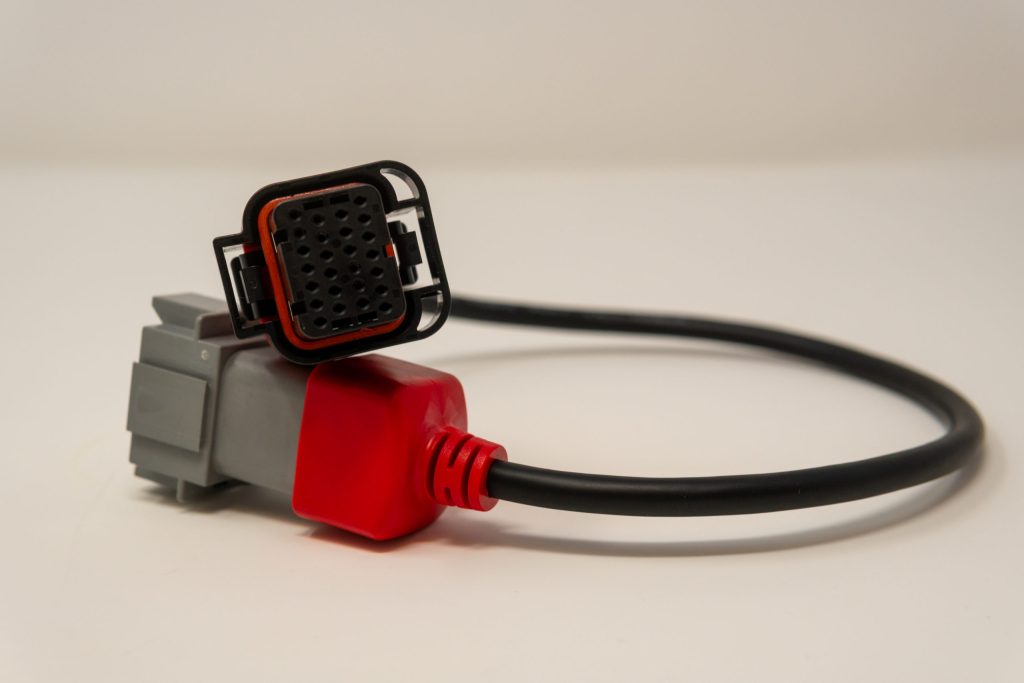 Cable assembly with DT and DTM-style connectors