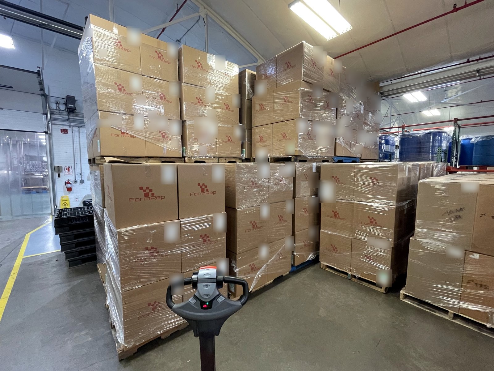 Pallets of FormRep boxed inventory in a warehouse