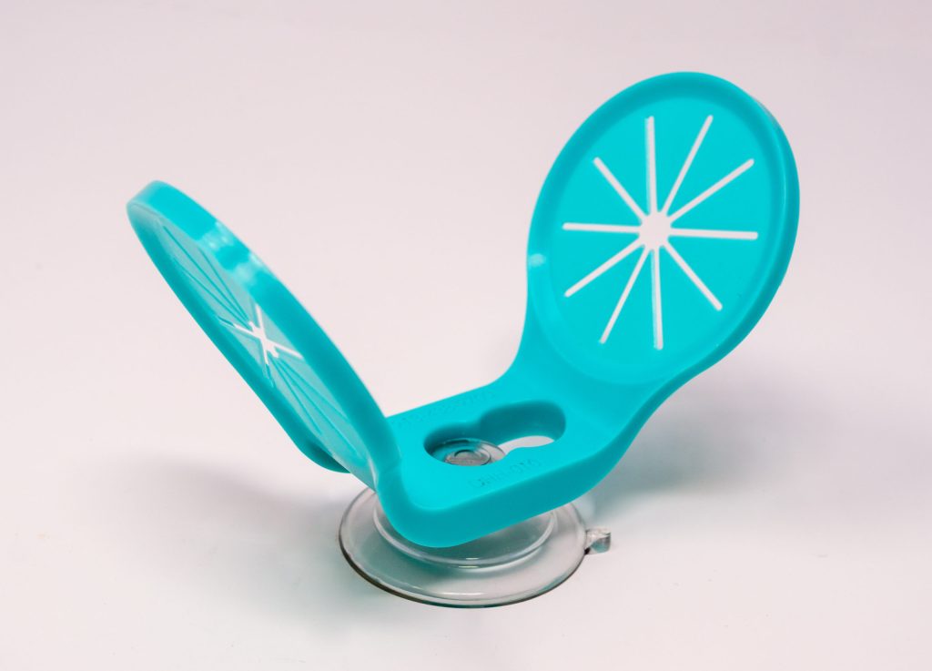 Teal molded holder with suction-cup base