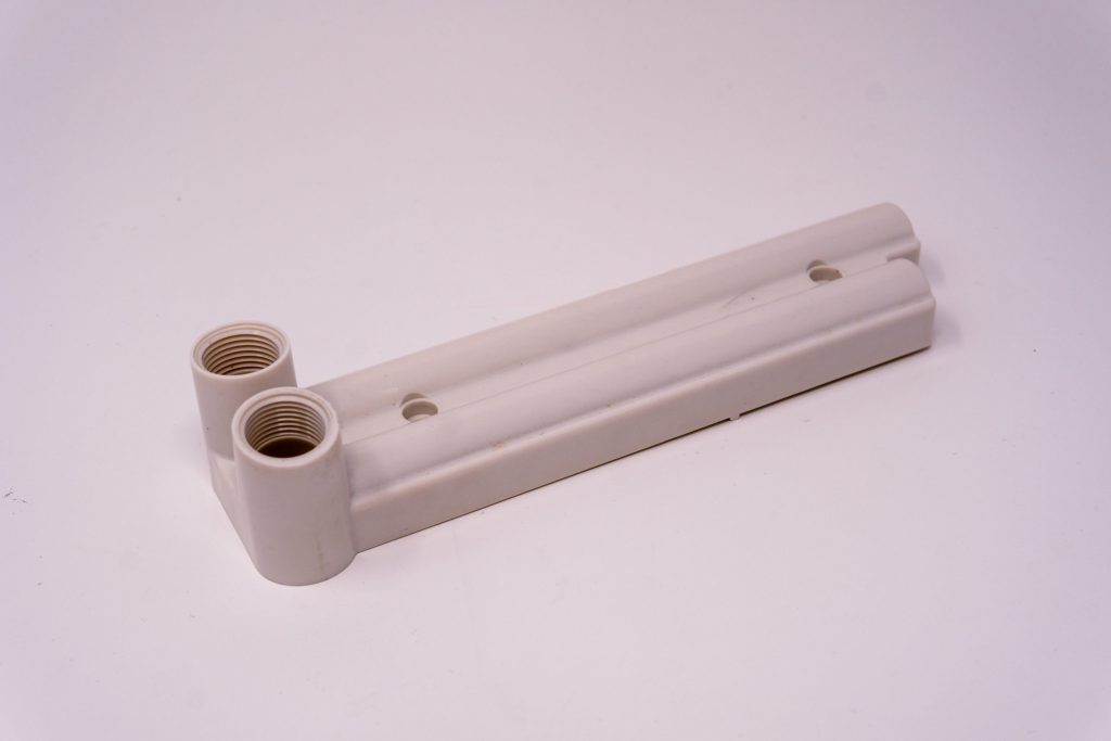 White molded mounting arm
